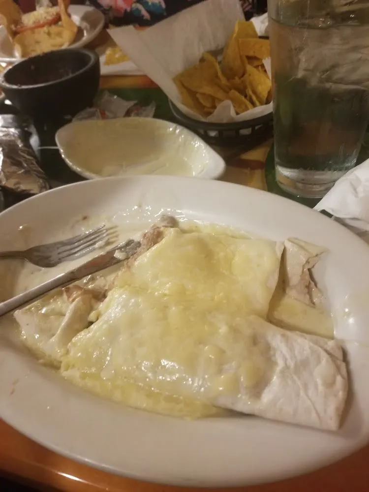 Two Bean Burritos with Cheese Dip on Top